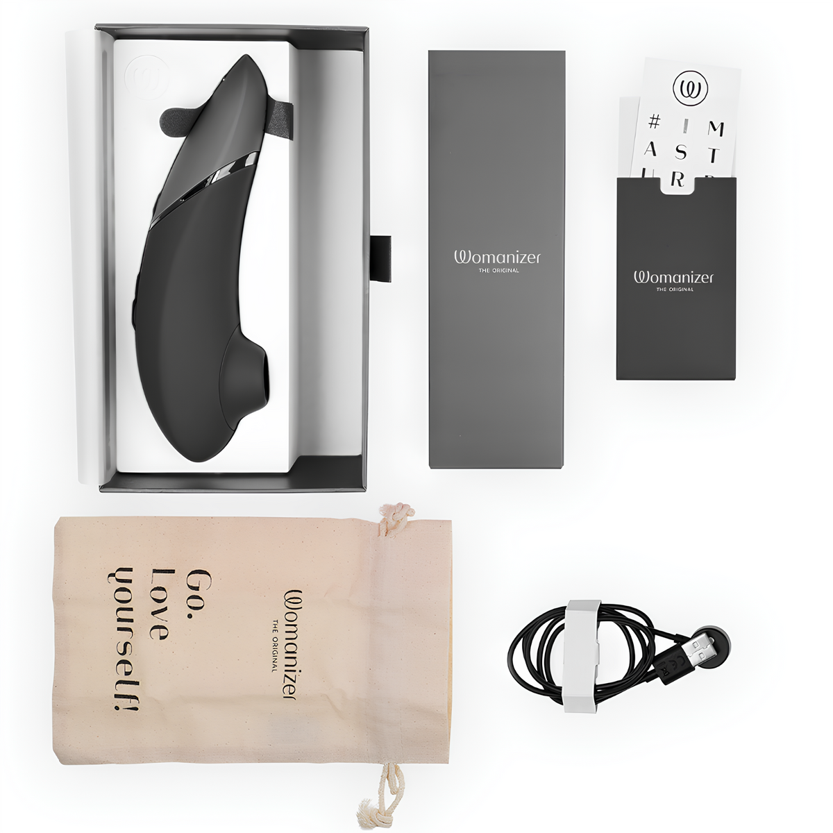 Contenu du coffret du Womanizer Next noir : stimulateur, câble et pochette